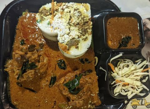 Dhe Puttu Edappally beef puttu with beef gravy