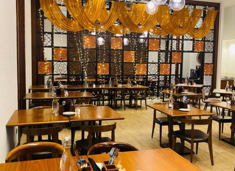 Kochi Kitchen Kochi Marriott Hotel stylish indoor seating view