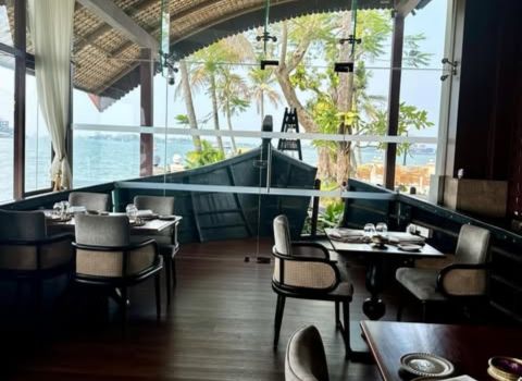 The Rice Boat Taj Malabar Resort Kochi indoor seating and interior styled like a traditional kerala houseboat