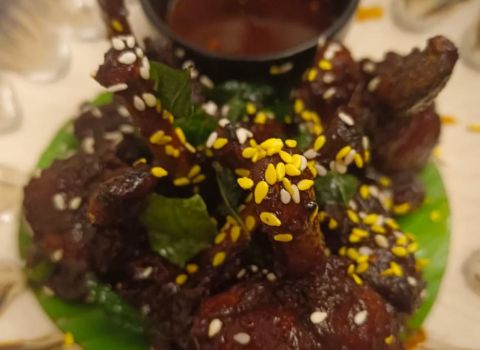 Restaurant Chef Pillai Le Méridien Kochi inji puli chicken wings dish