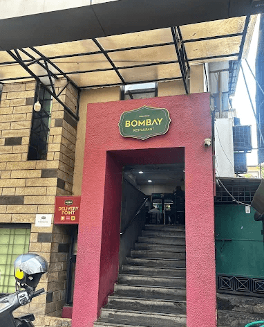 Bombay Restaurant entrance in Kozhikode, India, with signage