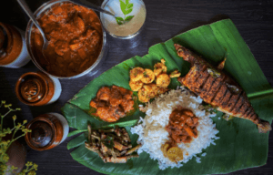 kerala seafood meals served on banana leaf