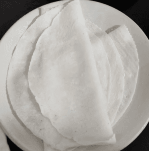 nice ari pathiri on a wite plate
