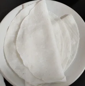 nice ari pathiri on a wite plate
