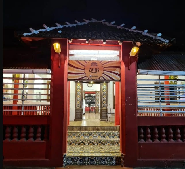 Zains HotelCalicut front view at night