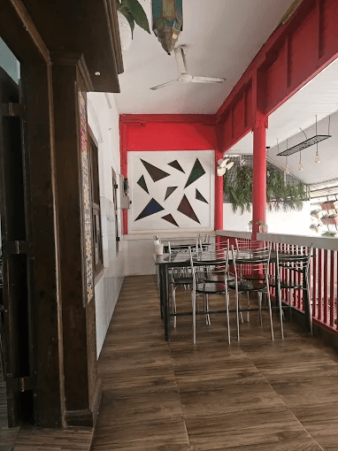 zains hotel calicut outdoor seating terrace setup